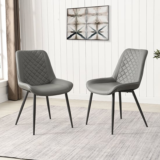 Read more about Oston grey faux leather dining chairs with anthracite legs in pair