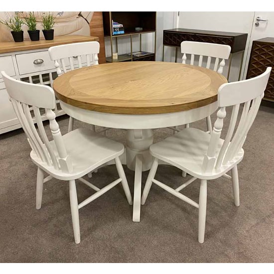 Photo of Oxford round extending dining set with 4 chairs