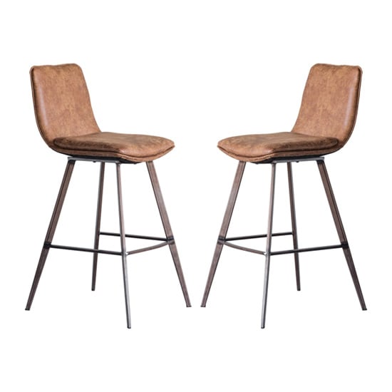 Photo of Palmar brown faux leather bar stools with metal legs in a pair