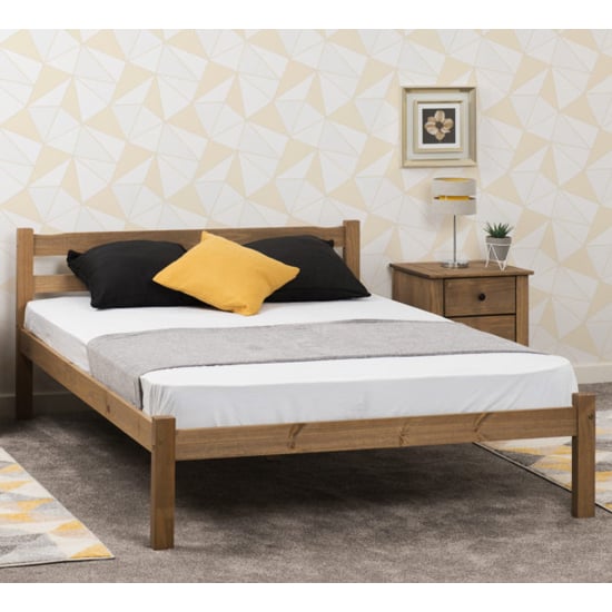 Read more about Prinsburg wooden double bed in natural wax