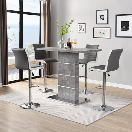 Photo of Parini concrete effect bar table with 4 ritz grey white stools