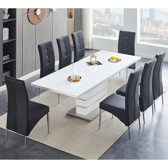 Photo of Parini extending white gloss dining table 8 vesta black chairs