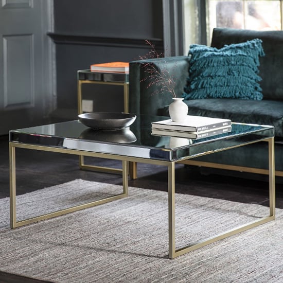 Photo of Petard mirrored coffee table with champagne metal frame