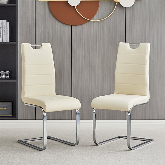 Photo of Petra cream faux leather dining chairs in pair