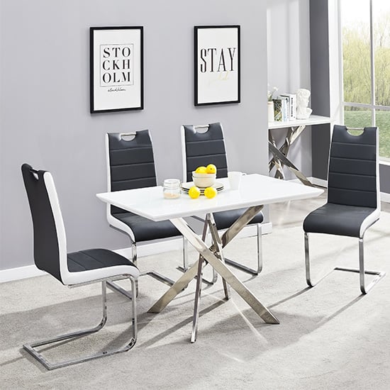 Read more about Petra small white glass dining table 4 petra black white chairs