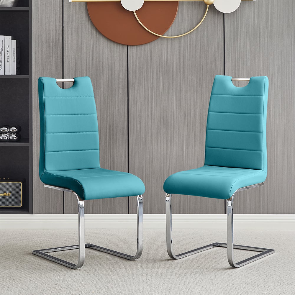 Read more about Petra teal faux leather dining chairs in pair