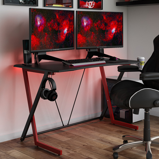 Read more about Powick gaming desk in black carbon fibre effect and red legs