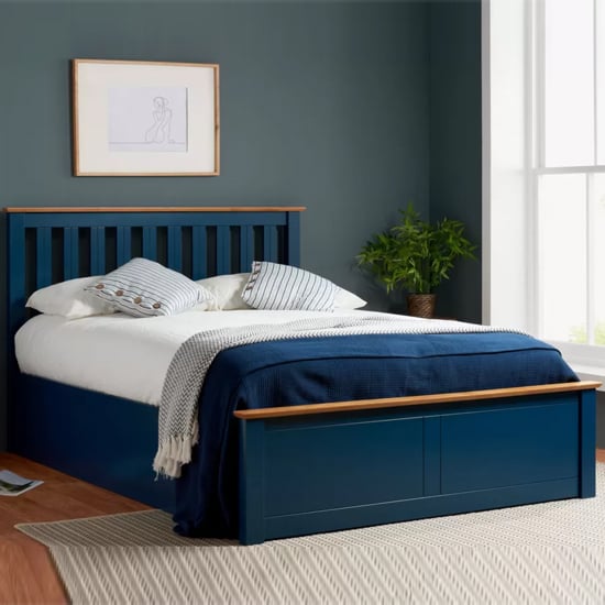 Read more about Phoney rubberwood ottoman double bed in navy blue