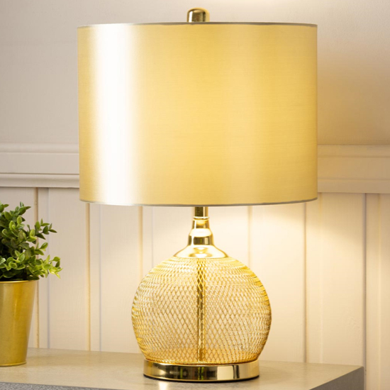 Photo of Plains champagne shade table lamp with gold wire mesh base