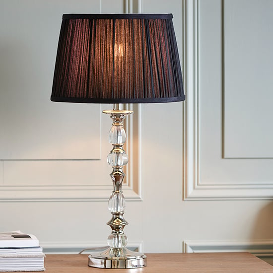 Photo of Polina medium table lamp in polished nickel with black shade