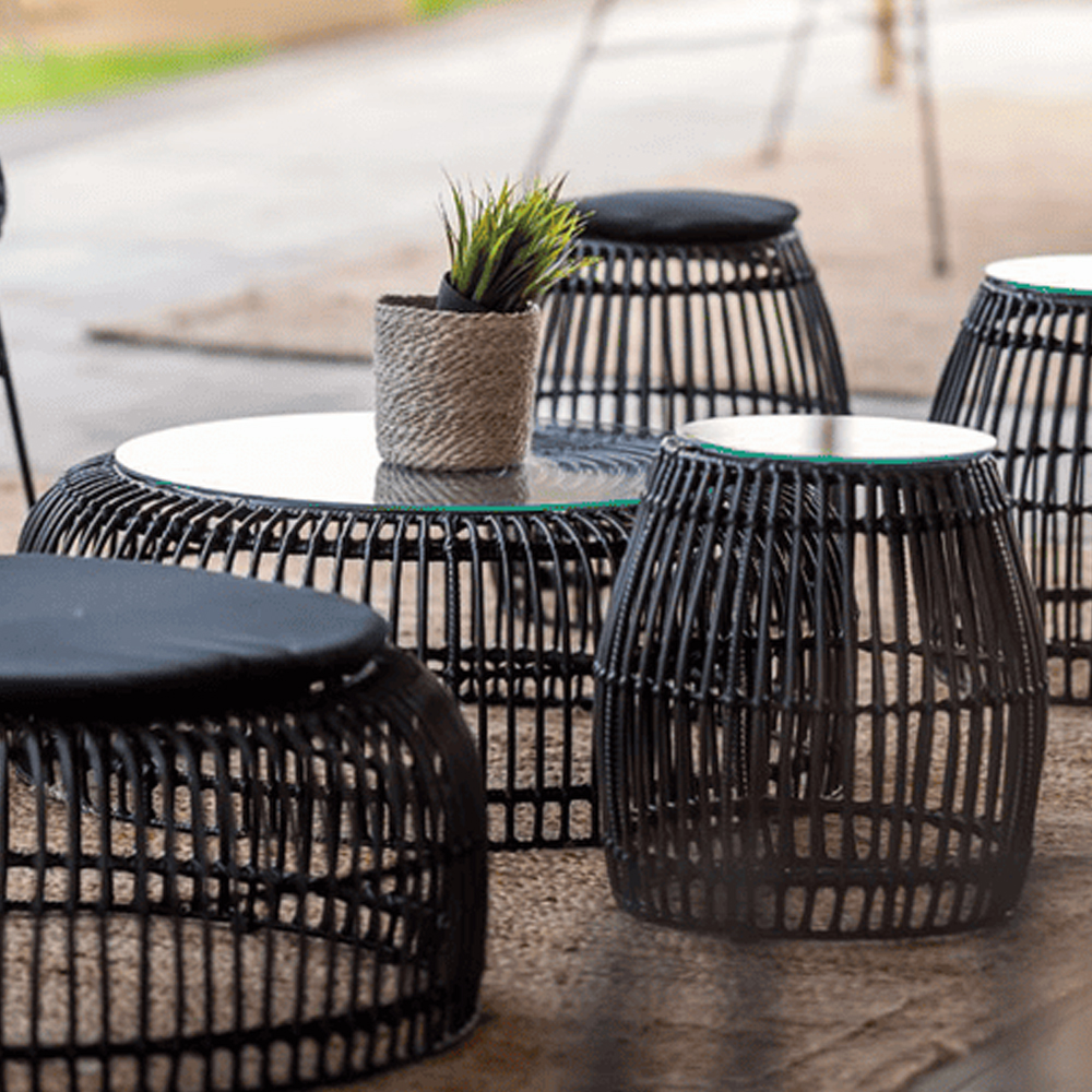 Ponoka Glass Top Outdoor Side Table With Rattan Base In Black