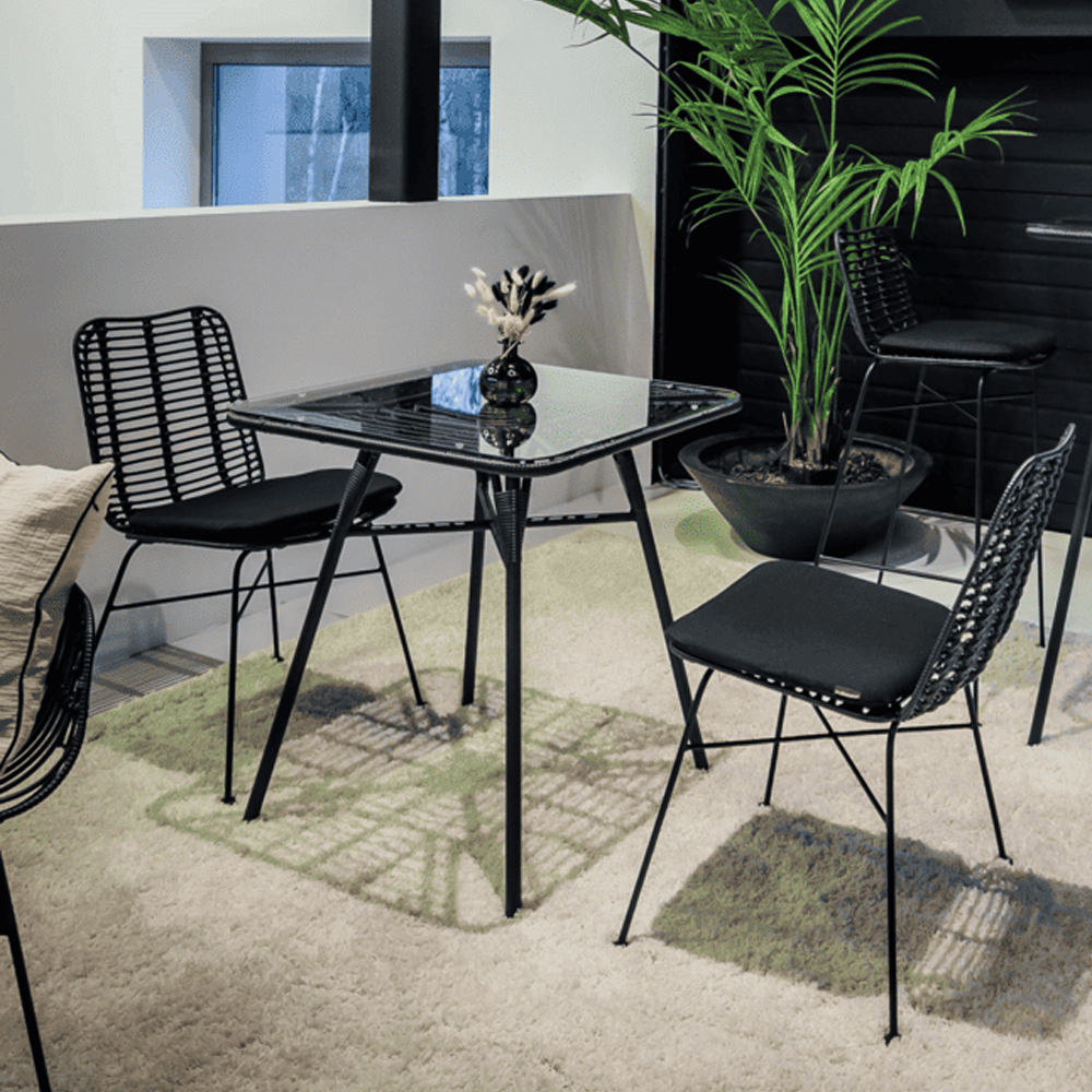 Ponoka Rattan Outdoor Stacking Side Chair In Black