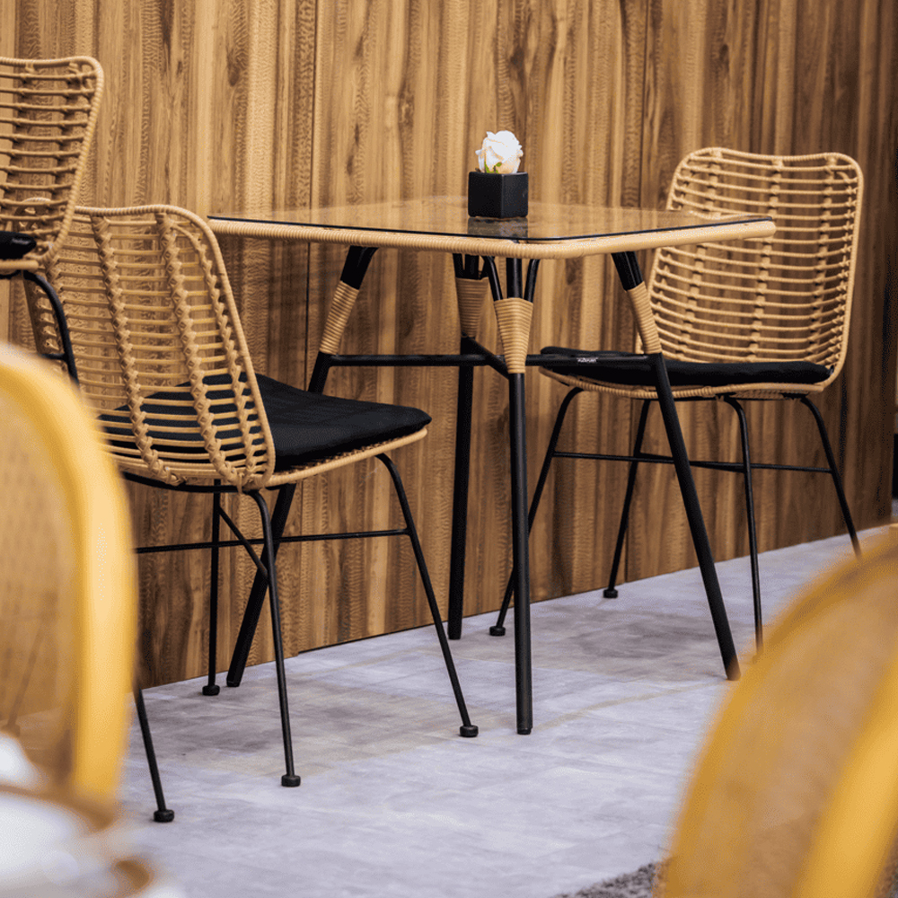 Ponoka Rattan Outdoor Stacking Side Chair In Natural