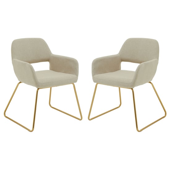 Photo of Porrima natural fabric dining chairs with gold base in a pair