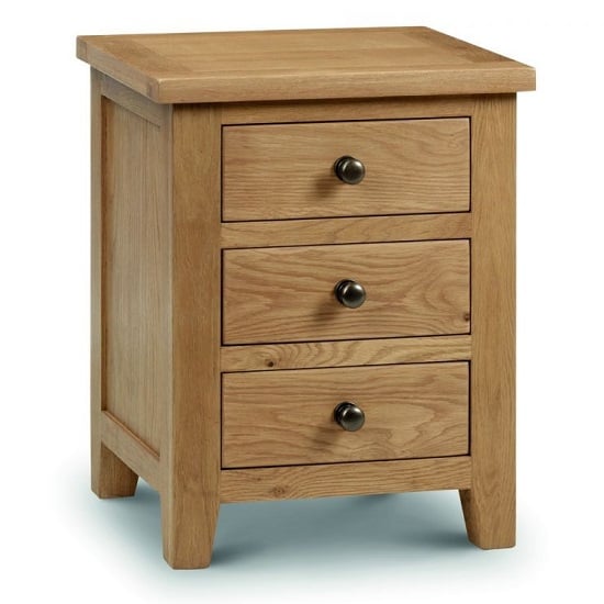 Photo of Mabli three drawers bedside cabinet in waxed oak finish