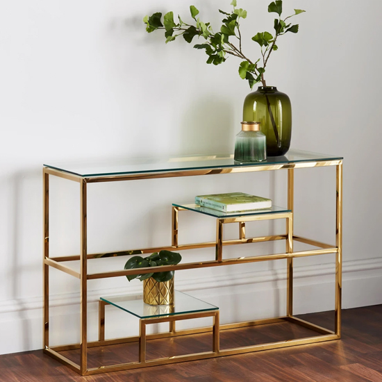 Read more about Portia clear glass display console table with gold metal frame