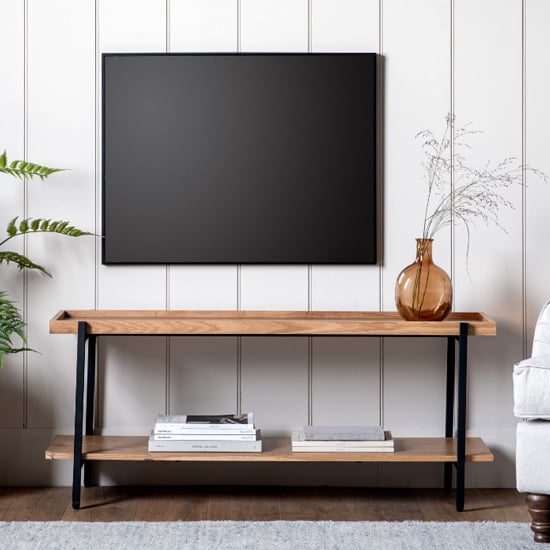 Photo of Powell wooden tv stand in natural with black metal frame