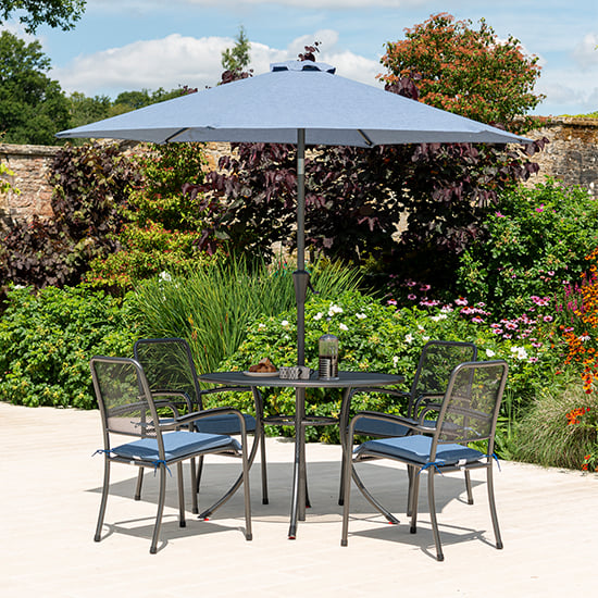 Product photograph of Prats Outdoor Dining Table With 4 Chairs And Parasol In Blue from Furniture in Fashion