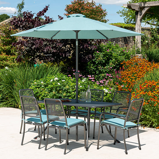 Product photograph of Prats Outdoor Dining Table With 6 Chairs And Parasol In Jade from Furniture in Fashion