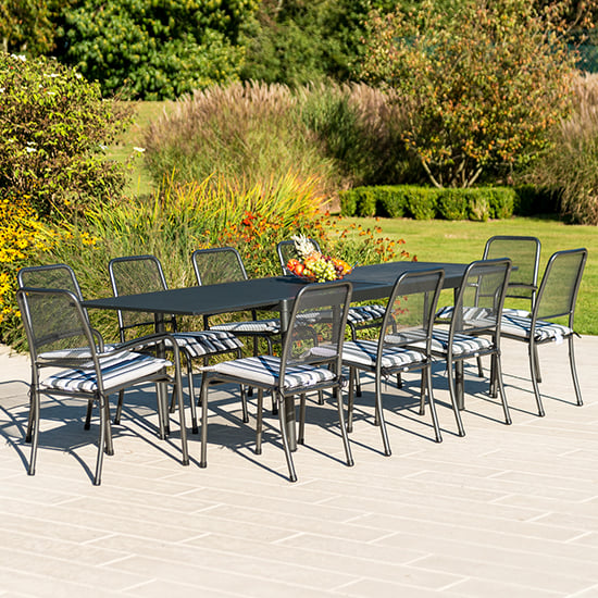 Photo of Prats outdoor extending dining table and 10 chairs in charcoal