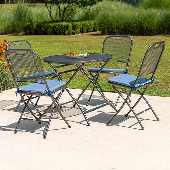 Photo of Prats outdoor round dining table with 4 chairs in blue