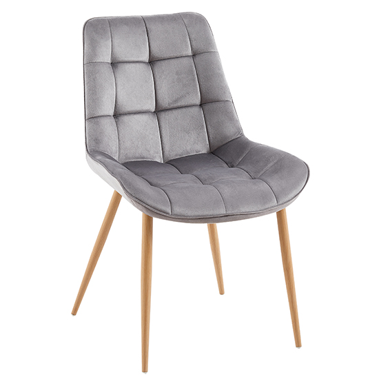Wodan velvet dining chair in grey with oak legs in a Browse over 500