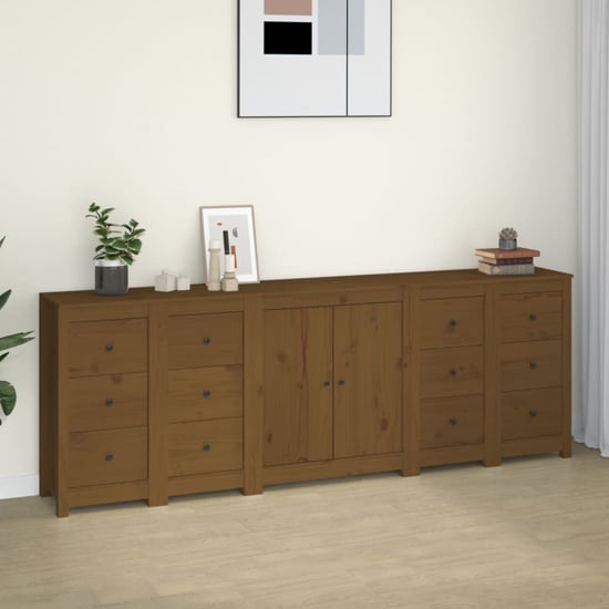Read more about Qabil pine wood sideboard with 2 doors 12 drawers in honey brown