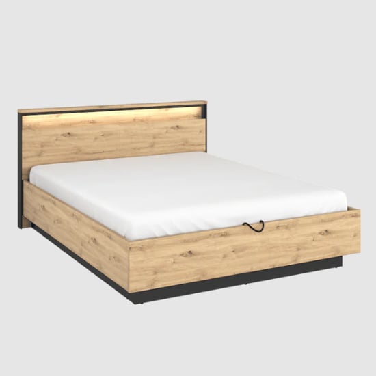 Read more about Qesso wooden ottoman king size bed in artisan oak and led