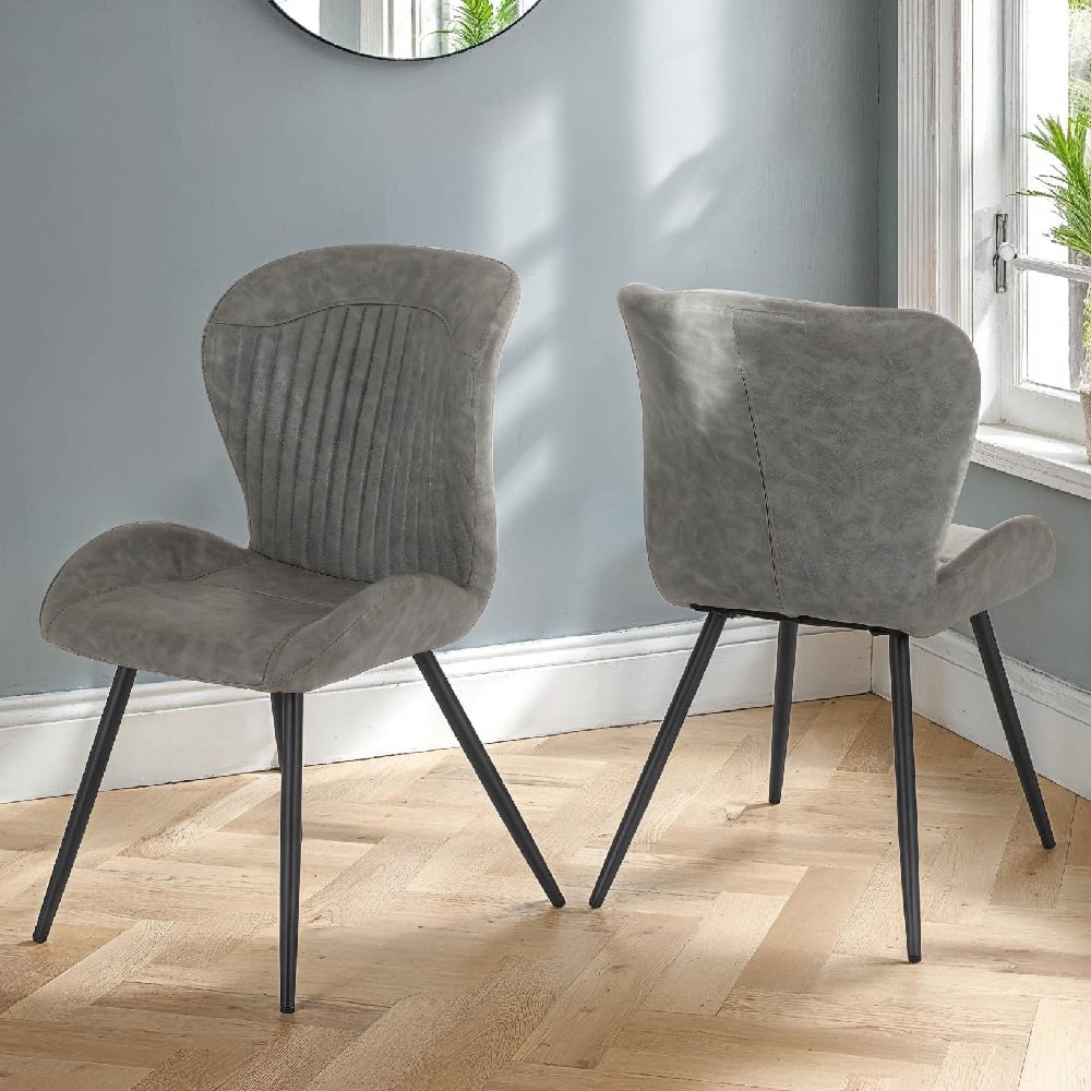 Read more about Qinson grey faux leather dining chairs in pair