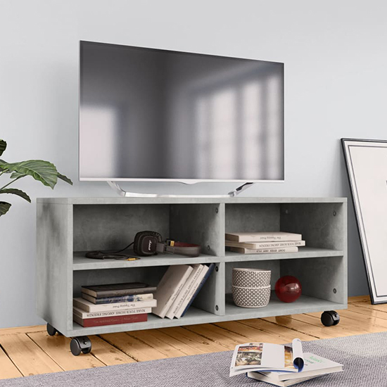 Read more about Qusay wooden tv stand with castors in concrete effect