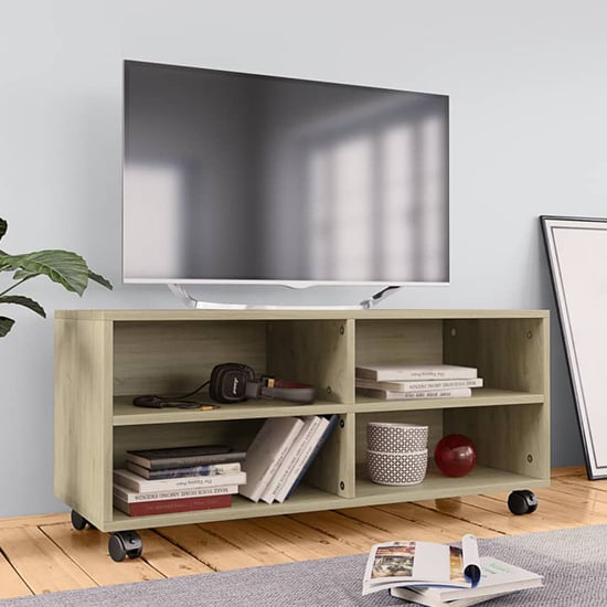 Read more about Qusay wooden tv stand with castors in sonoma oak