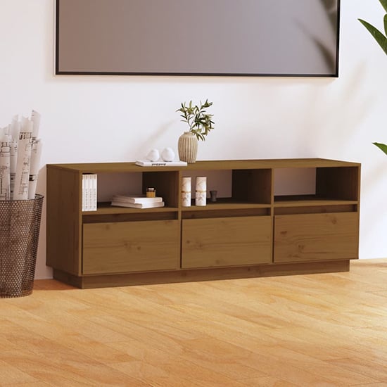 Photo of Qwara pine wood tv stand with 3 drawers in honey brown