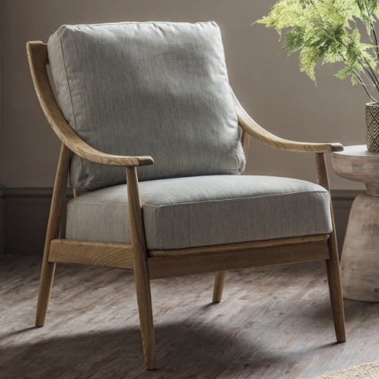 Photo of Radiant fabric armchair with wooden frame in natural