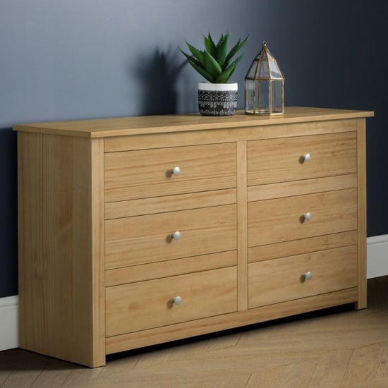 Photo of Raddix wide wooden chest of drawers in waxed pine with 6 drawers