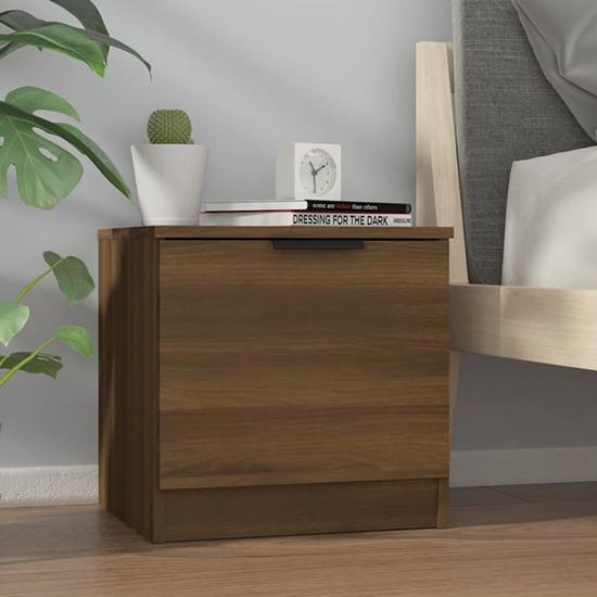 Photo of Ranya wooden bedside cabinet with 1 door in brown oak