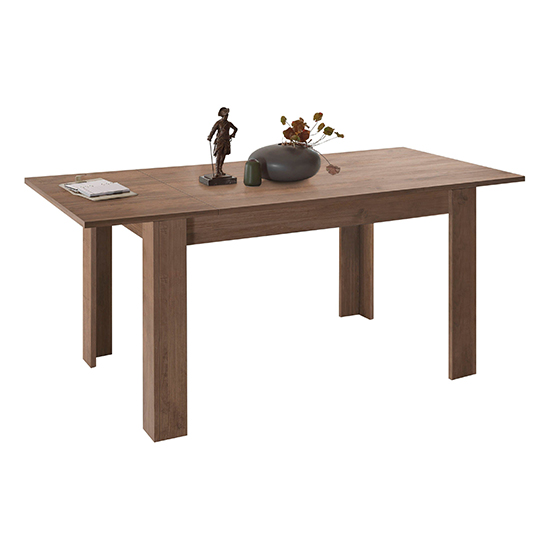 Photo of Raya extending wooden dining table in mercury