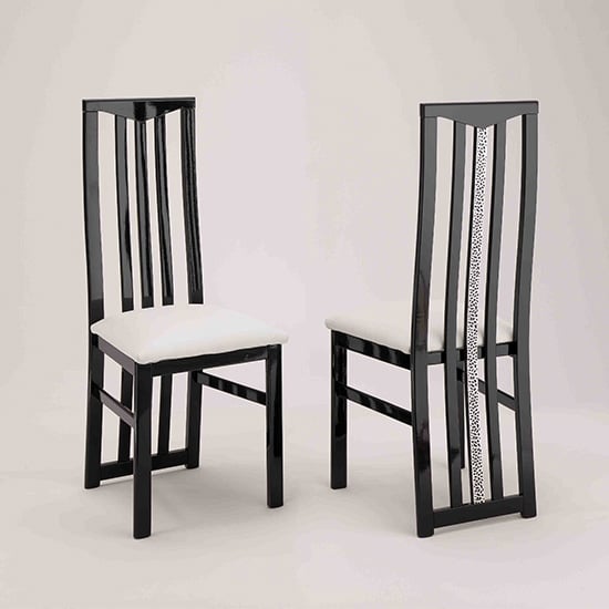 Photo of Regal dining chair in black and white with cromo details