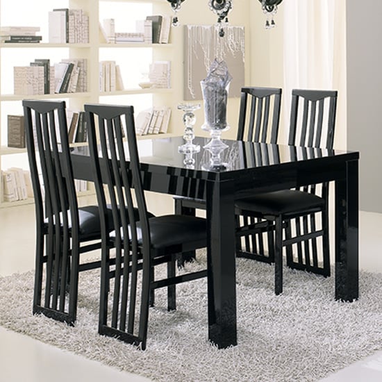 View Regal dining table in gloss black with 4 cexa black chairs