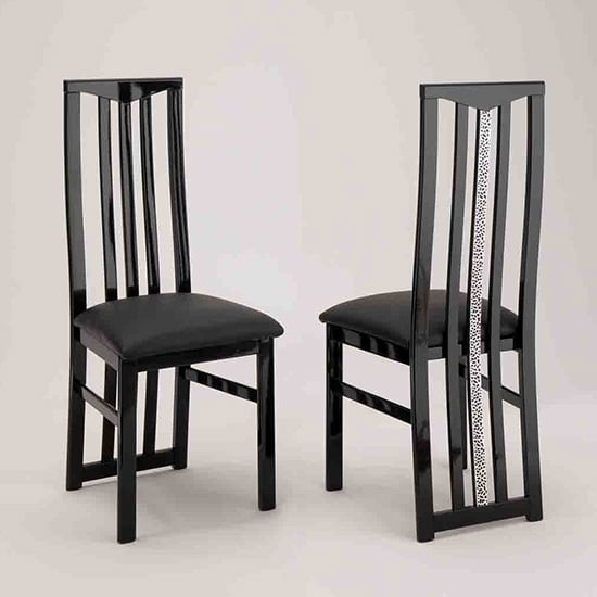 Read more about Regal black wooden dining chairs in pair