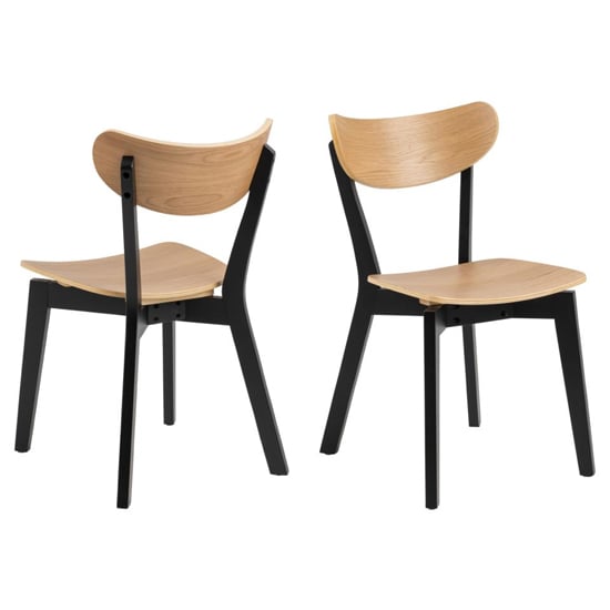 Read more about Reims oak rubberwood dining chairs with black legs in pair