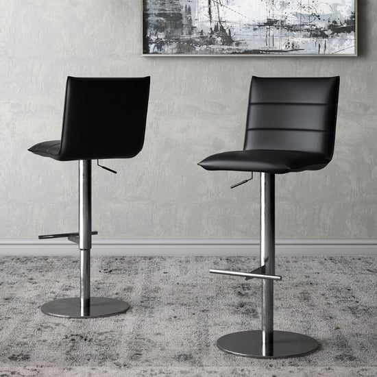 Read more about Radlett black faux leather bar stools in pair