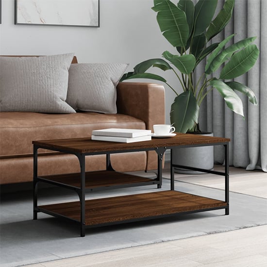 Read more about Rivas wooden coffee table with 2 shelves in brown oak