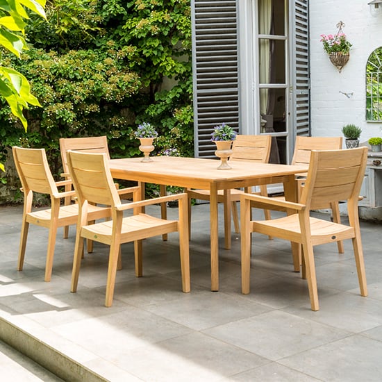Photo of Robalt extending dining table with 6 stacking chair in natural
