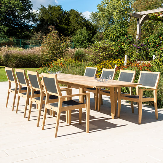 View Robalt extending dining table with 8 armchairs in natural