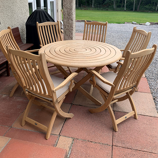 Photo of Robalt folding 1300mm dining table with 6 chairs in natural