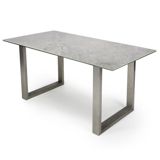 Photo of Rocca ceramic and glass dining table with steel base