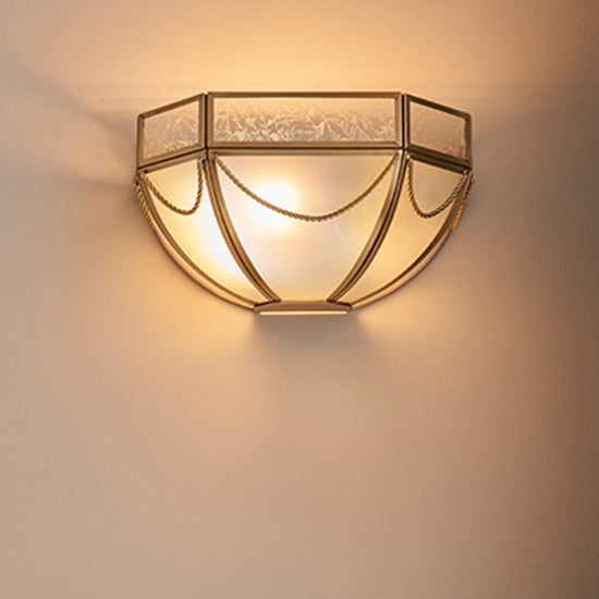 Read more about Russell frosted glass wall light in antique brass