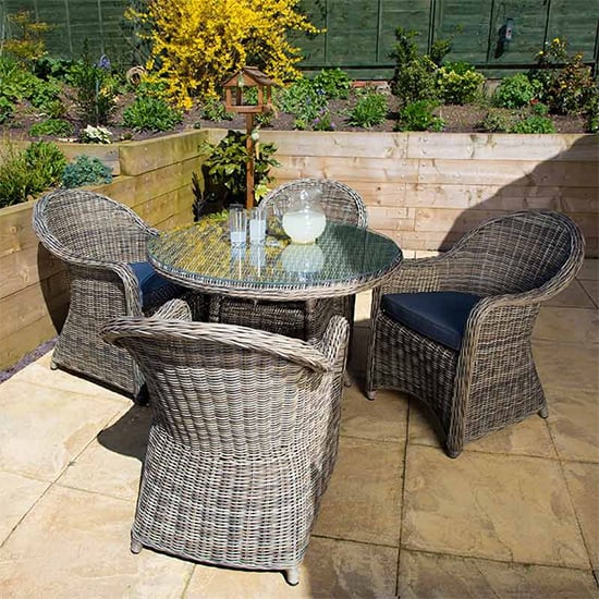 Read more about Ryker outdoor rattan dining table with 4 armchairs in brown grey