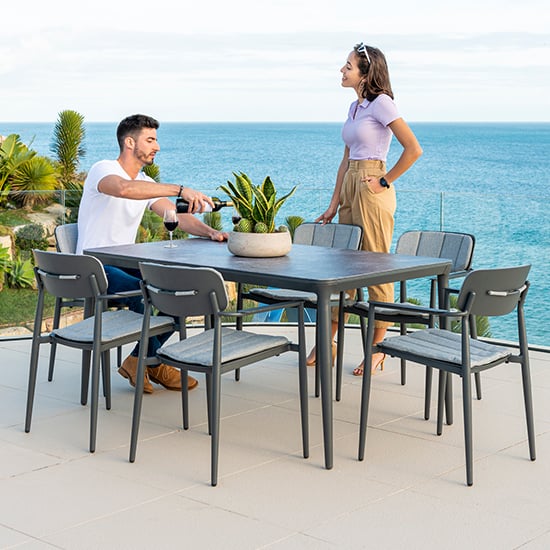 Product photograph of Rykon 1500mm Grey Ceramic Effect Glass Dining Table 6 Armchairs from Furniture in Fashion