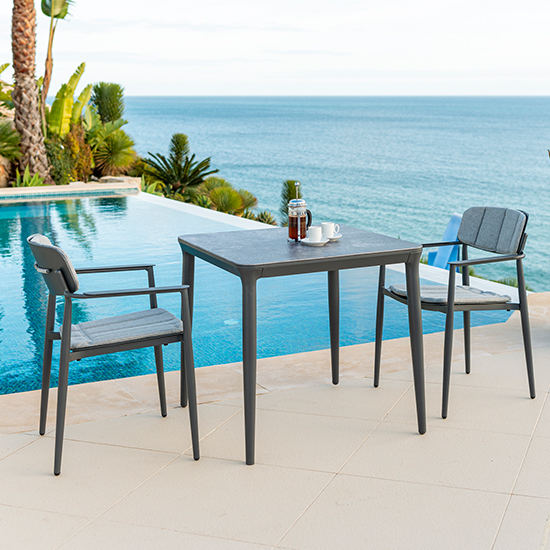 Read more about Rykon 750mm grey ceramic effect glass dining table 2 armchairs